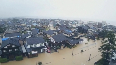 Japan orders evacuations as heavy rains trigger floods in quake-hit region